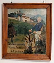 Altes Bild welches einen Fahrradfahrer zeigt.